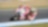 Superbike y piloto de Ducati corriendo por una curva de la pista
