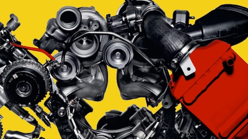 Imagen de un motor de auto sobre fondo amarillo