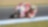 Superbike y piloto de Ducati corriendo por una curva de la pista